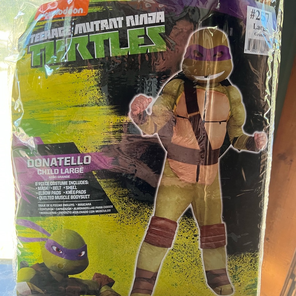New teenage mutant ninja turtle costume, kids size large (12-14) Donatello